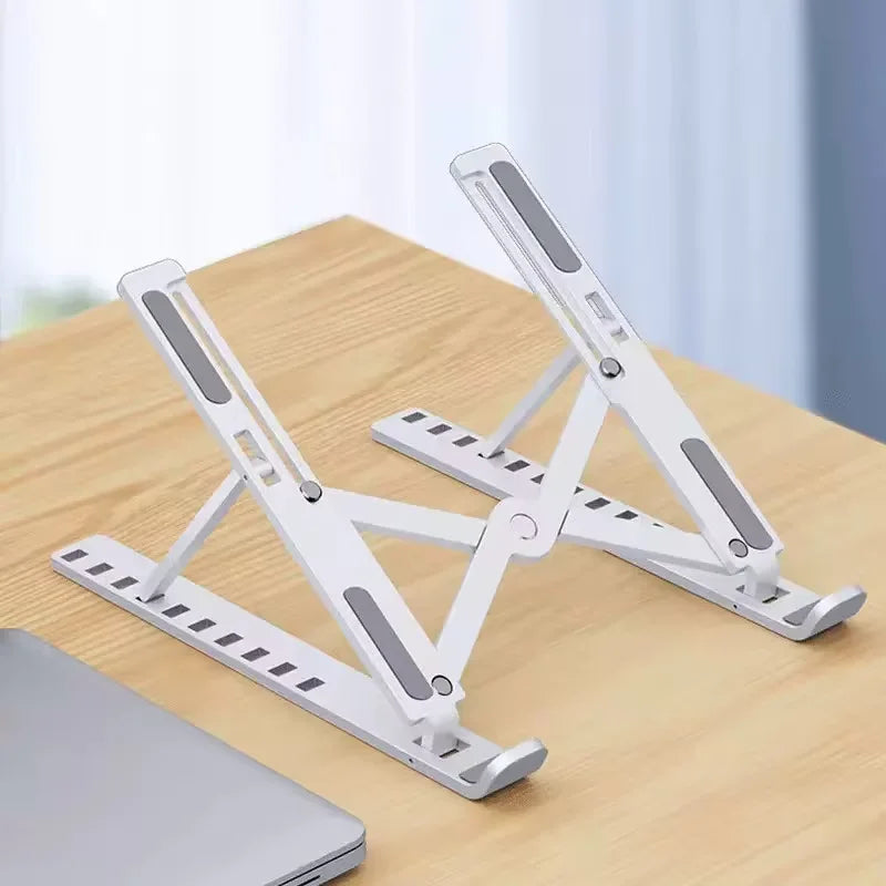 Ergonomic Adjustable Foldable Laptop Stand - Portable ABS Notebook Holder and Desktop Riser for MacBook, iPad, and Tablets